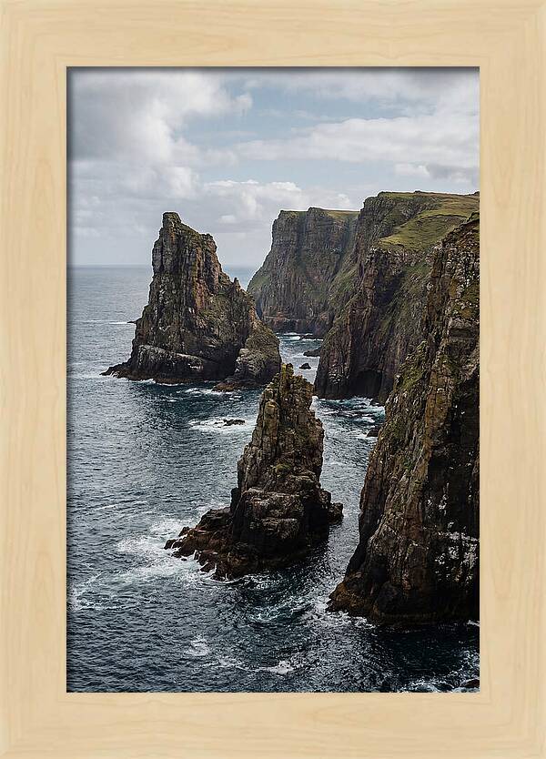 Dramatic Sea Stacks Rising From Water