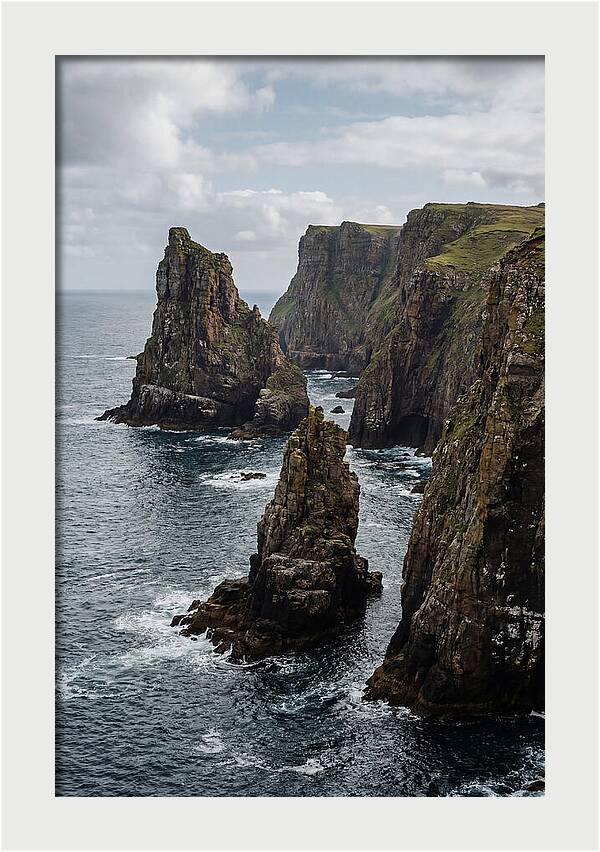 Dramatic Sea Stacks Rising From Water