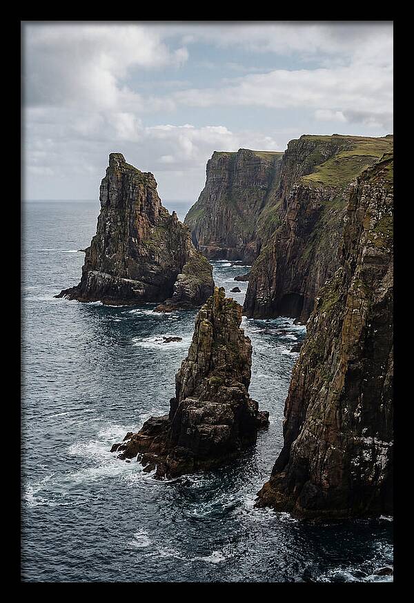 Dramatic Sea Stacks Rising From Water