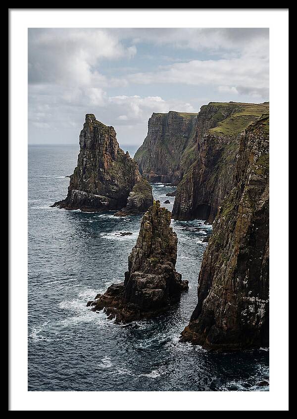 Dramatic Sea Stacks Rising From Water