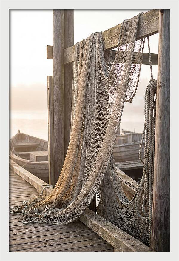 Drying Fishing Nets At Dawn