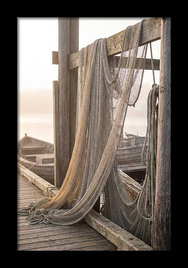 Drying Fishing Nets At Dawn