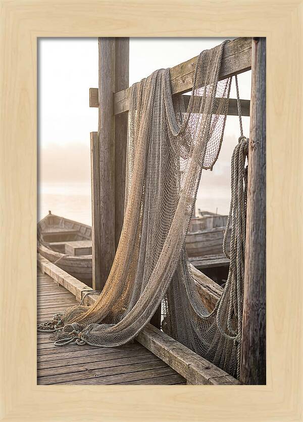 Drying Fishing Nets At Dawn