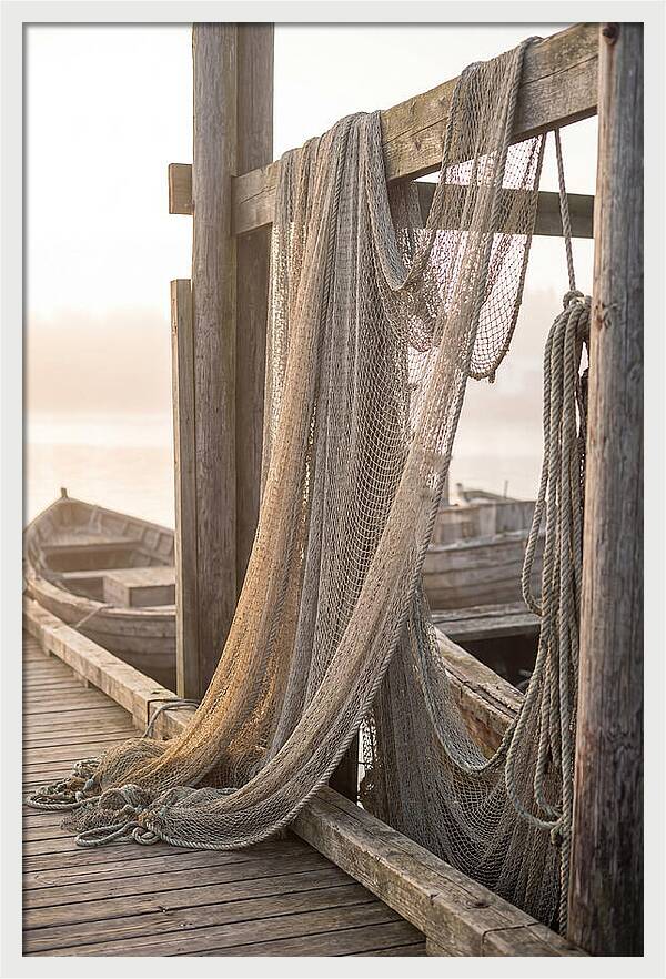 Drying Fishing Nets At Dawn