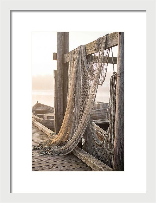 Drying Fishing Nets At Dawn