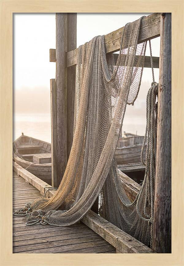 Drying Fishing Nets At Dawn