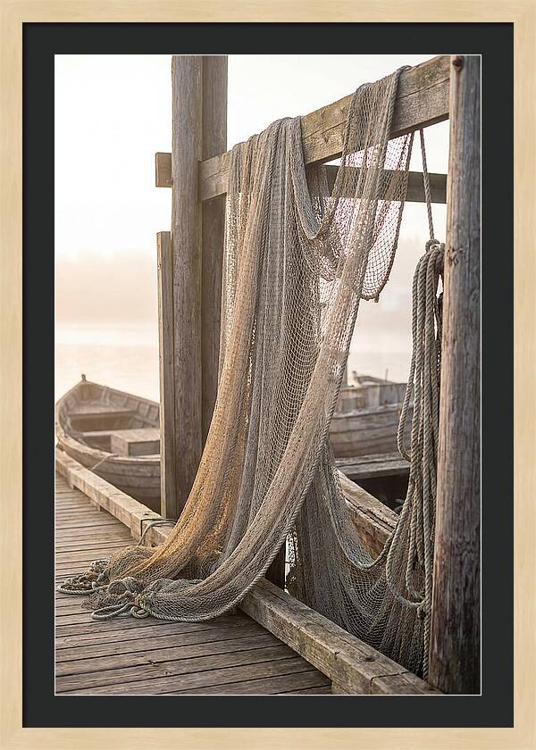 Drying Fishing Nets At Dawn