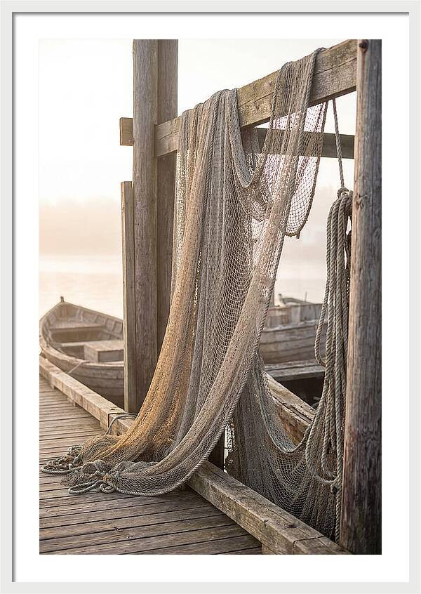 Drying Fishing Nets At Dawn