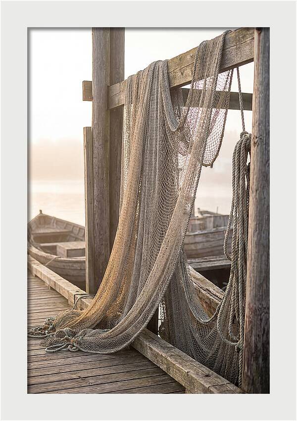 Drying Fishing Nets At Dawn