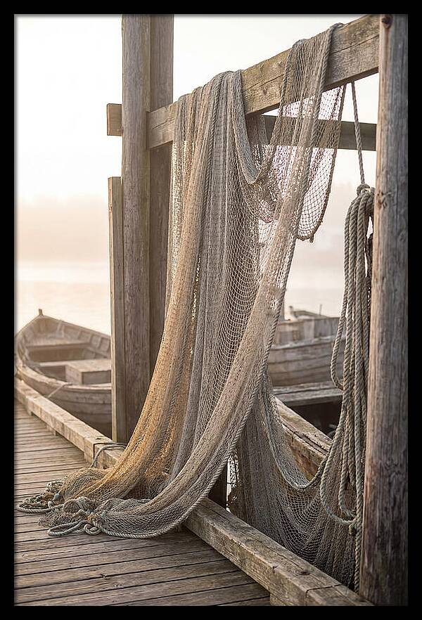 Drying Fishing Nets At Dawn