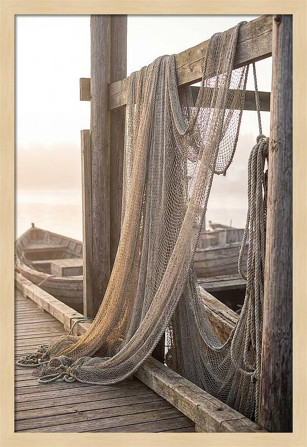 Drying Fishing Nets At Dawn