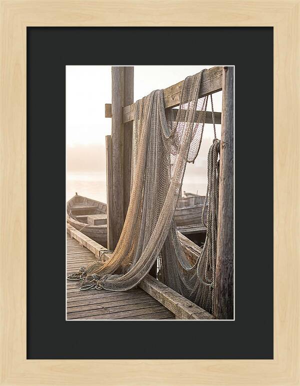 Drying Fishing Nets At Dawn