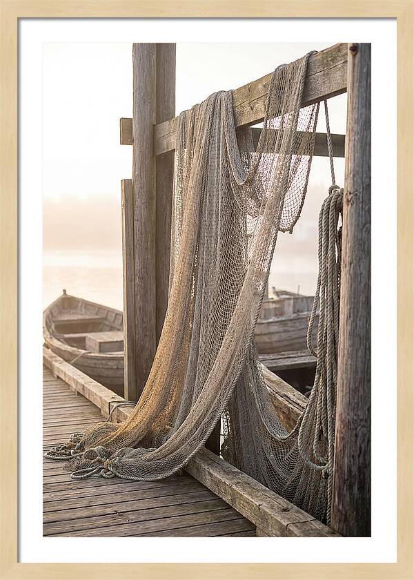 Drying Fishing Nets At Dawn