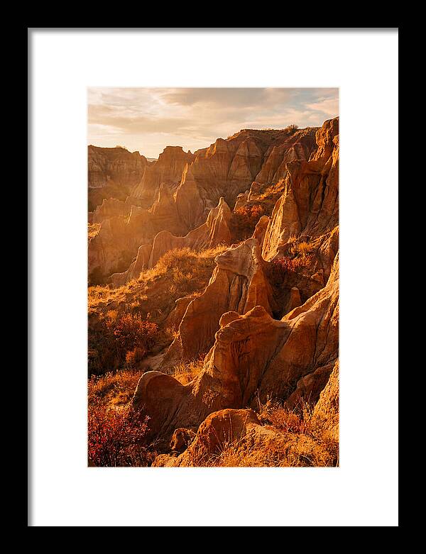 Eroded Mudstone Formations At Sunset