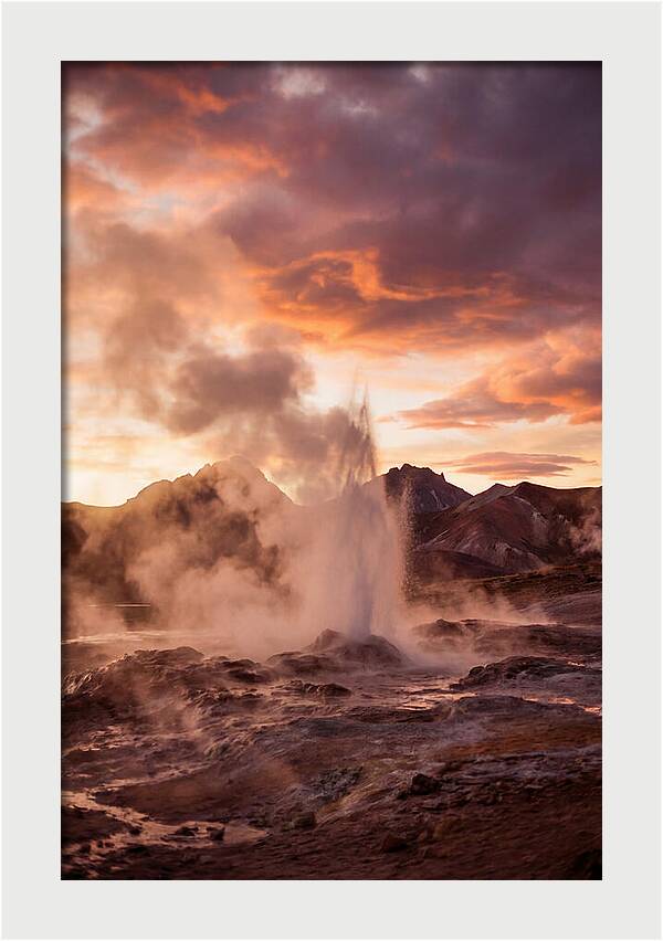 Erupting Geyser At Dusk