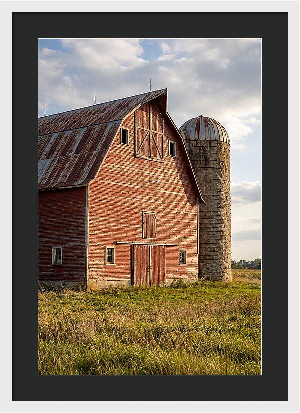 Farmhouse Charm In Rustic Landscape