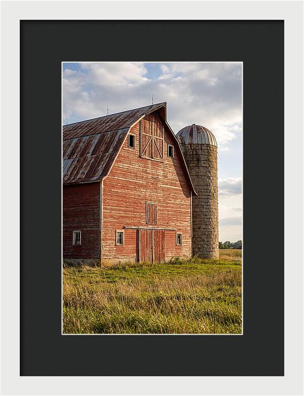 Farmhouse Charm In Rustic Landscape