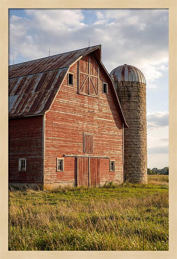 Farmhouse Charm In Rustic Landscape