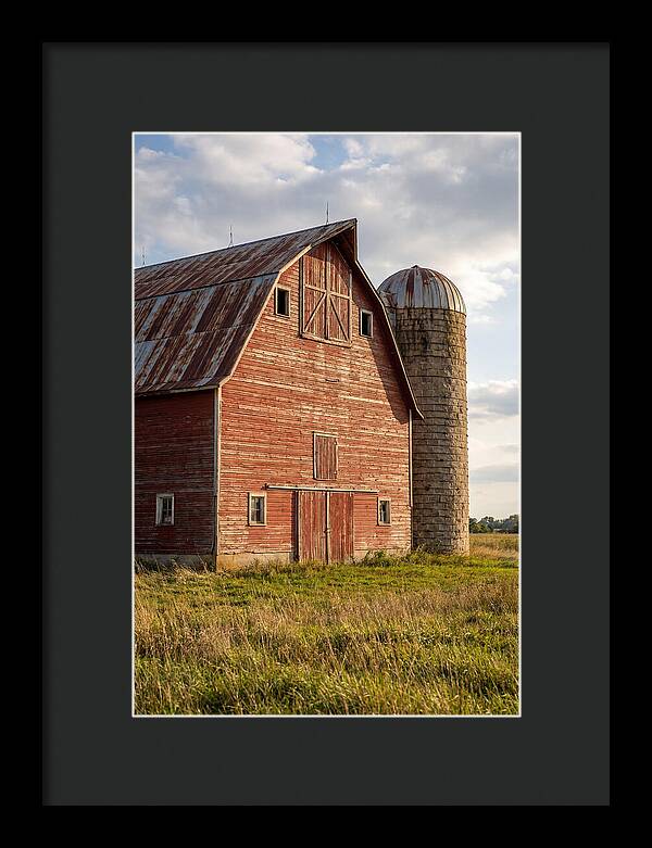 Farmhouse Charm In Rustic Landscape