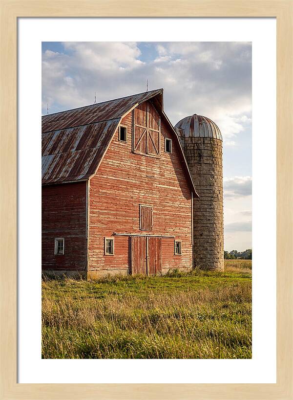 Farmhouse Charm In Rustic Landscape