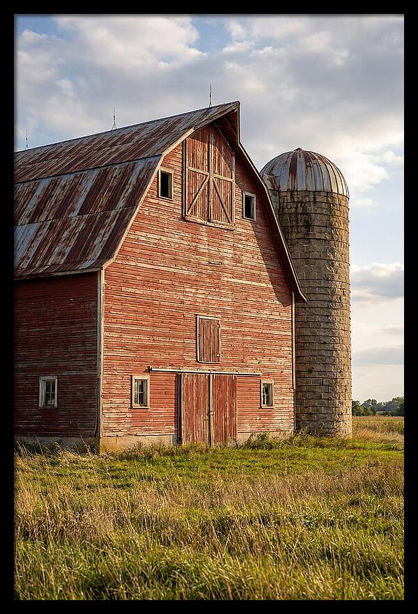 Farmhouse Charm In Rustic Landscape
