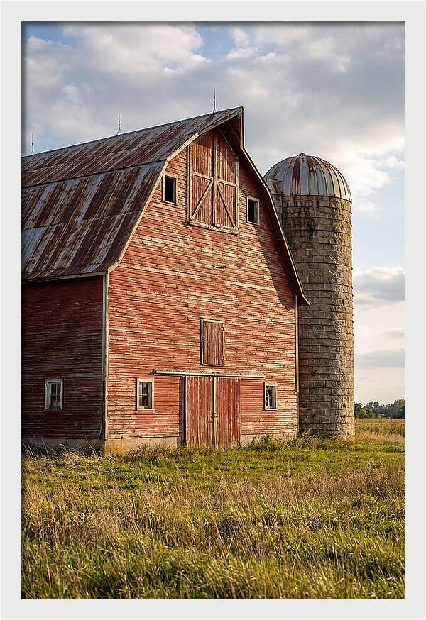 Farmhouse Charm In Rustic Landscape