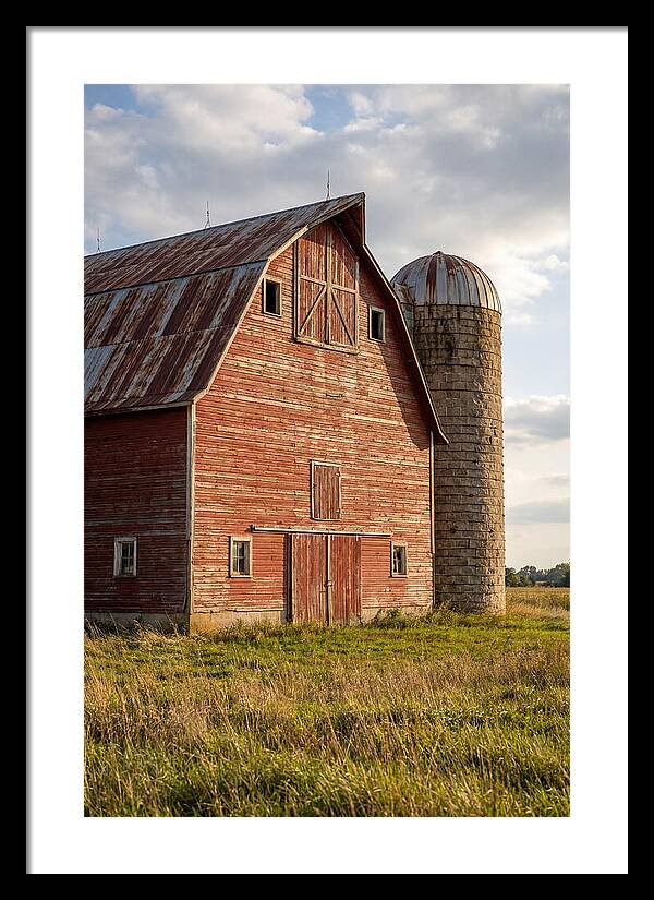 Farmhouse Charm In Rustic Landscape