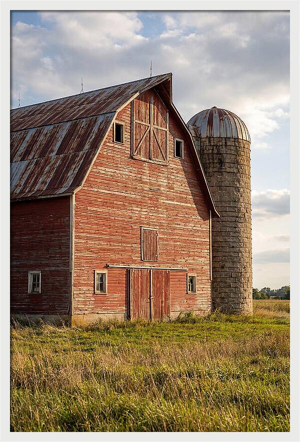 Farmhouse Charm In Rustic Landscape