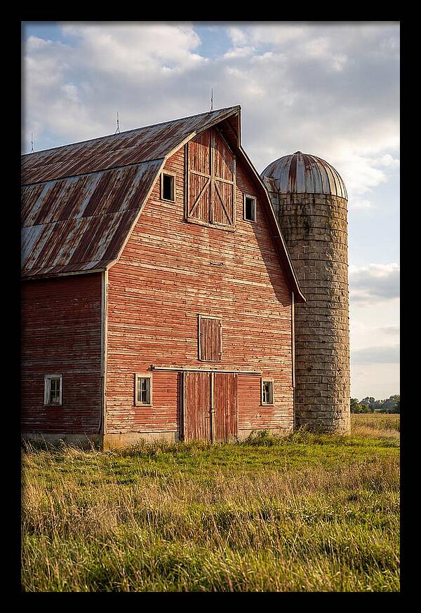 Farmhouse Charm In Rustic Landscape