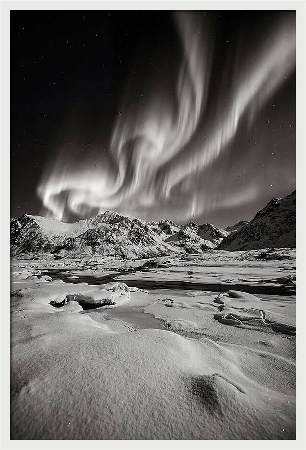 Finnish Aurora Over Snowy Landscape