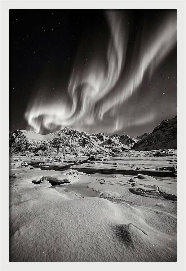 Finnish Aurora Over Snowy Landscape
