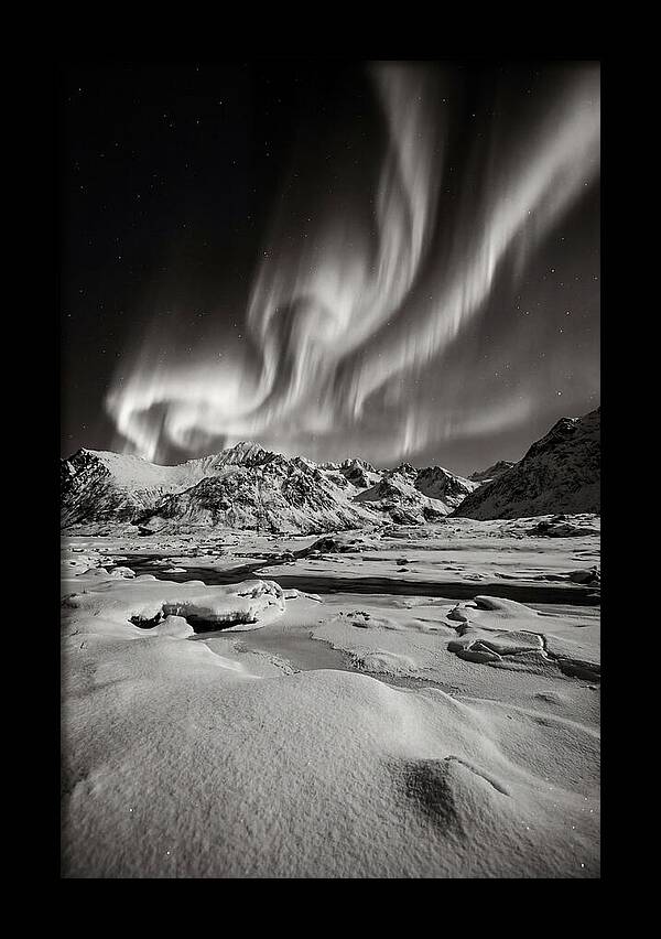 Finnish Aurora Over Snowy Landscape