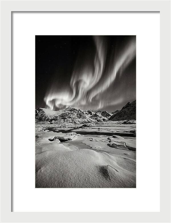 Finnish Aurora Over Snowy Landscape