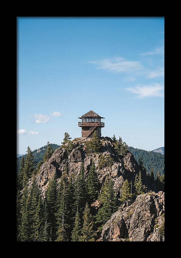 Fire Lookout Tower Above The Forest