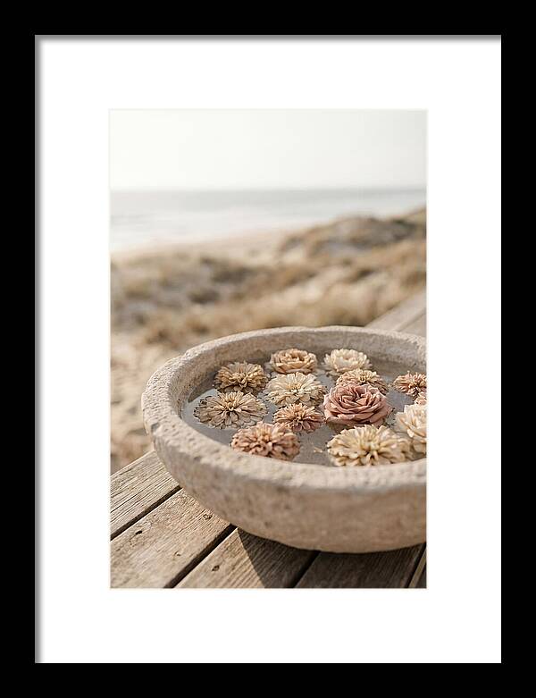 Floating Flower Heads In Shallow Stone Bowl