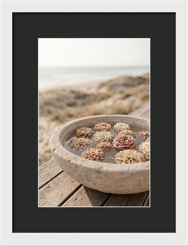 Floating Flower Heads In Shallow Stone Bowl
