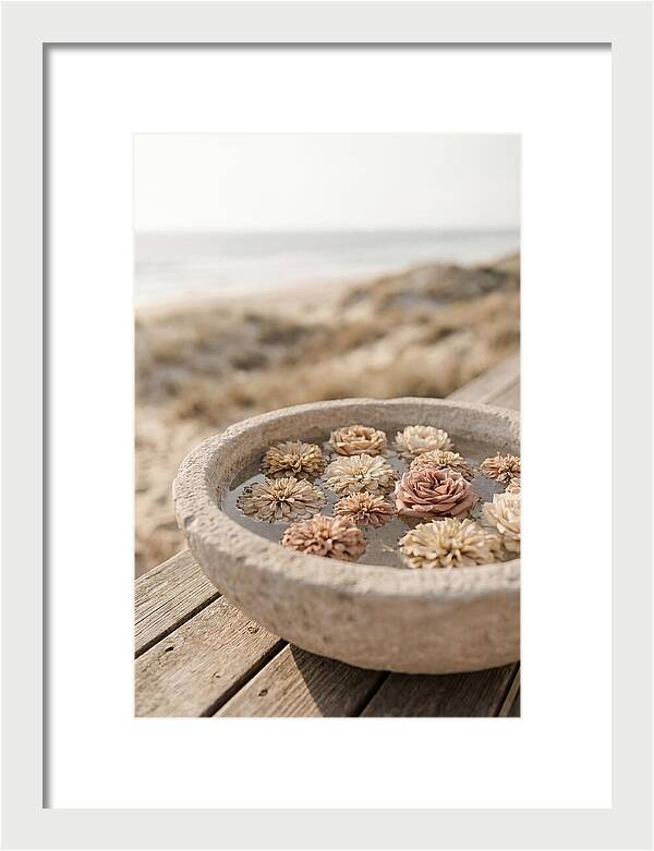 Floating Flower Heads In Shallow Stone Bowl