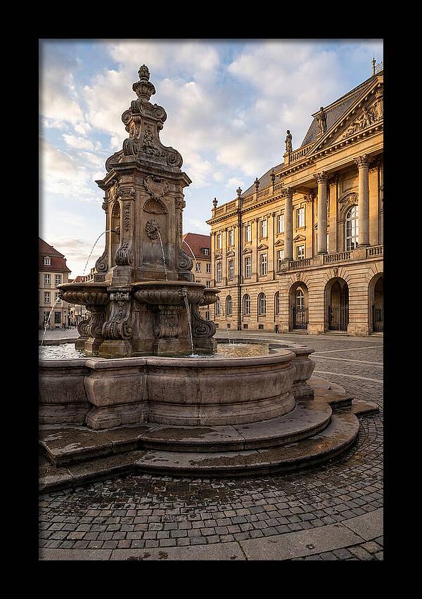 Fountain Amidst Historic Architecture