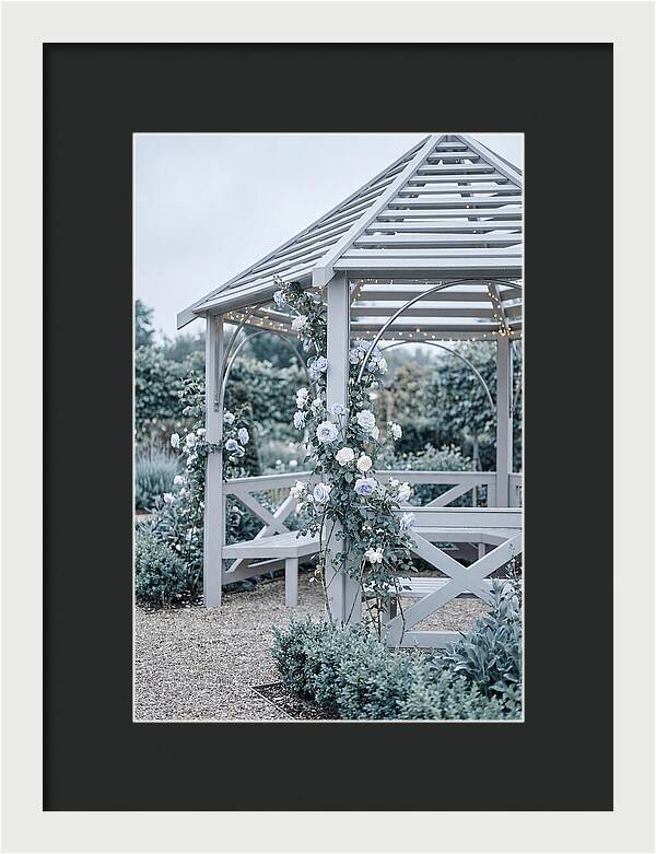 Garden Gazebo Embraced By Roses