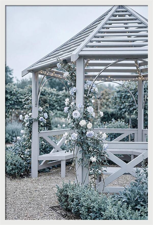 Garden Gazebo Embraced By Roses