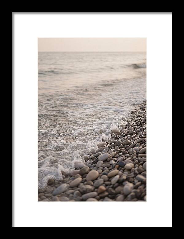 Gentle Waves Lapping On Pebble Beach