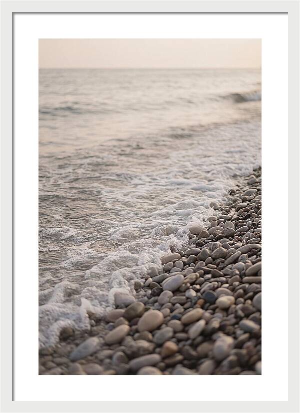 Gentle Waves Lapping On Pebble Beach