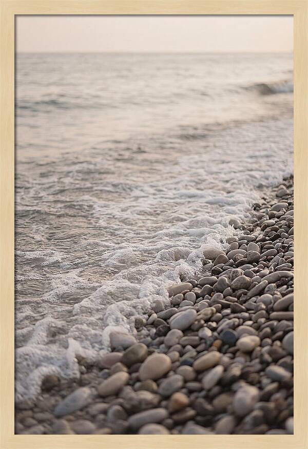 Gentle Waves Lapping On Pebble Beach