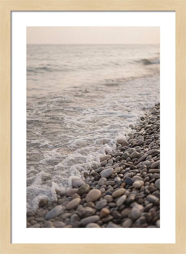 Gentle Waves Lapping On Pebble Beach