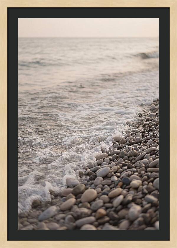 Gentle Waves Lapping On Pebble Beach