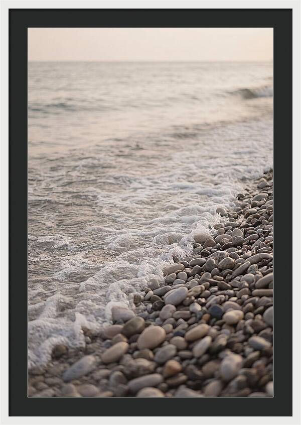 Gentle Waves Lapping On Pebble Beach