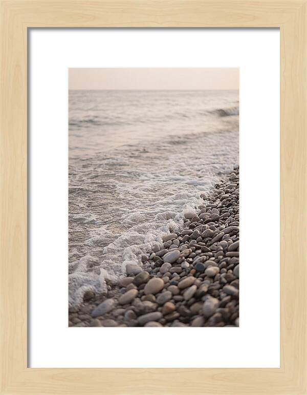Gentle Waves Lapping On Pebble Beach