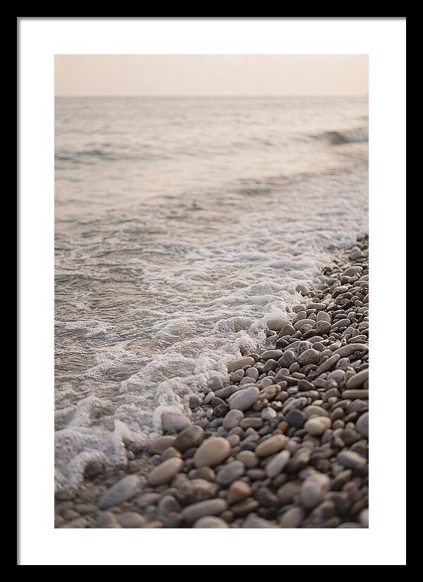 Gentle Waves Lapping On Pebble Beach