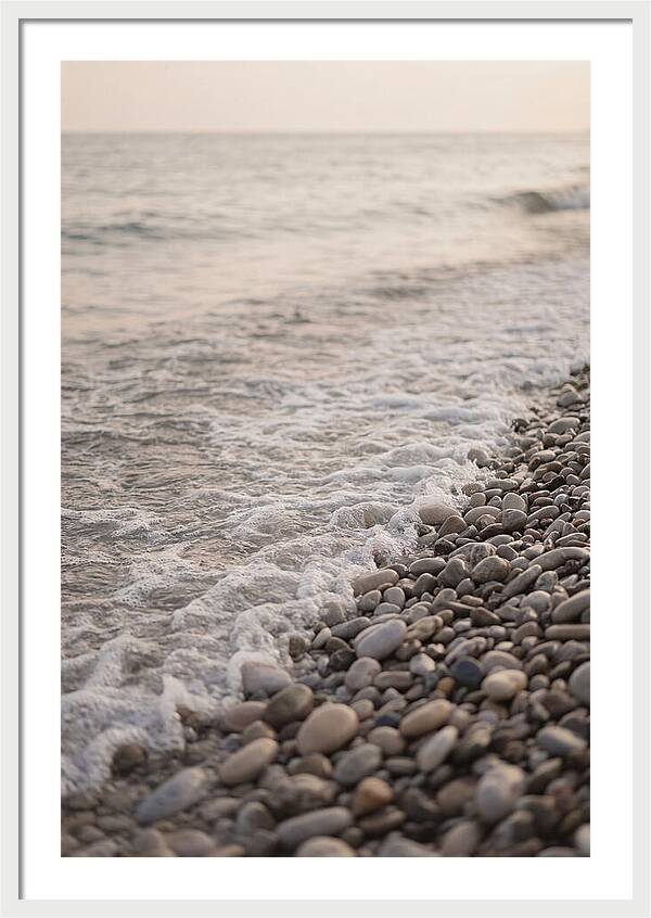 Gentle Waves Lapping On Pebble Beach
