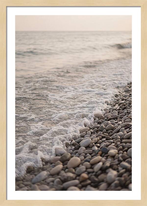 Gentle Waves Lapping On Pebble Beach